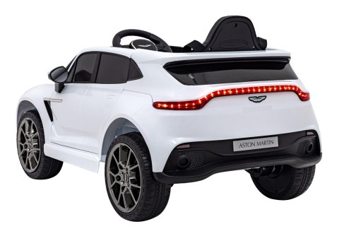 Aston Martin DBX na akumulator dla dzieci Biały + Pilot + EVA + Pasy + Wolny Start + Audio LED Aston Martin DBX na akumulator dla dzieci Biały + Pilot + EVA + Pasy + Wolny Start + Audio LED